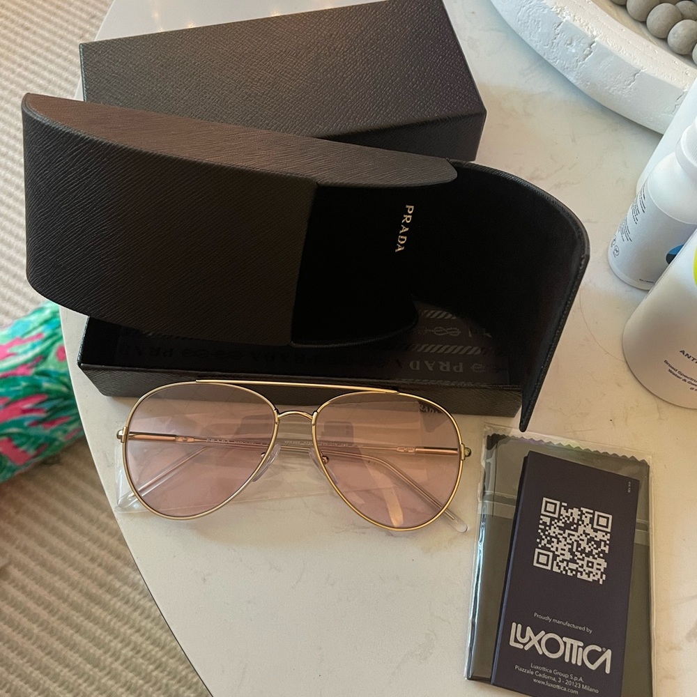 Brand new Prada sunglasses - bought them off revolve. Never been worn